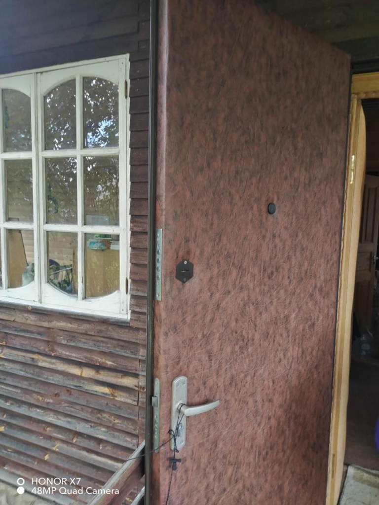 Результат обивки входной двери